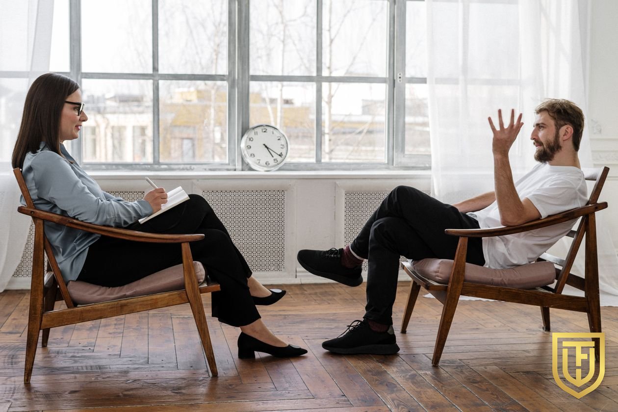 Counselor taking notes during a one-on-one session