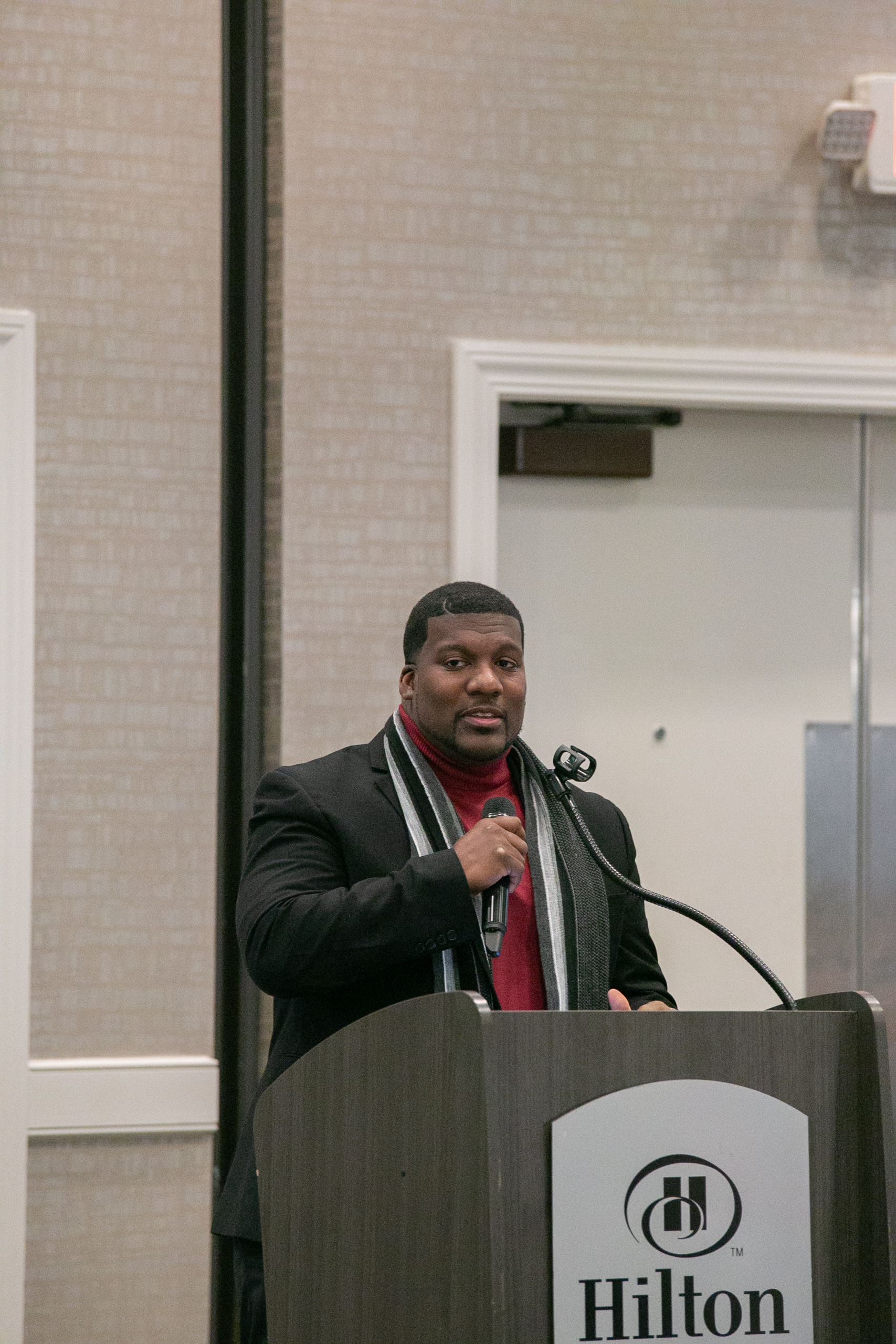 Daryan Wilkinson speaking on workforce leadership at the Hilton